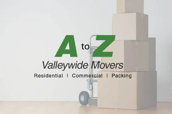 A to Z Valleywide Movers logo over a photo of moving boxes stacked on a hand truck