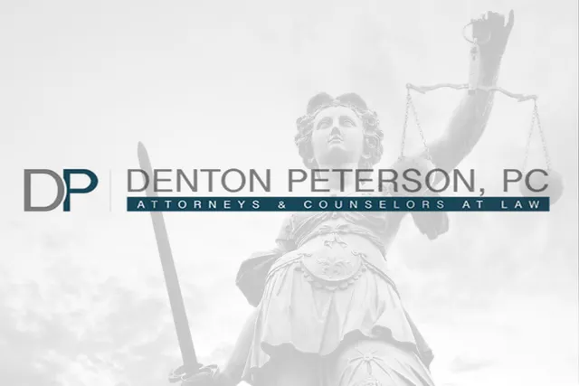 Denton Peterson PC attorneys and counselors at law logo over a statue of Lady Justice